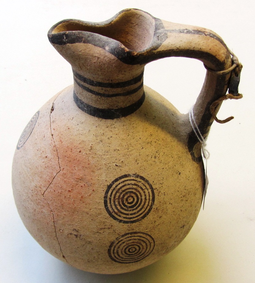 Appraisal: A Cypriot white painted ware oinochoe decorated with concentric circles