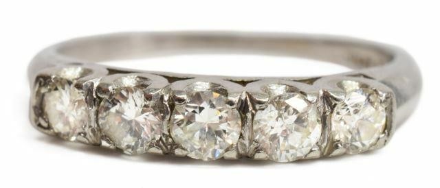 Appraisal: Estate platinum ring set with five round cut diamonds approx