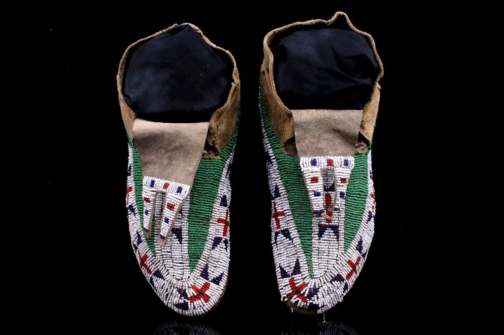 Appraisal: Sioux Fully Top Beaded Bifurcated Moccasins th C This is