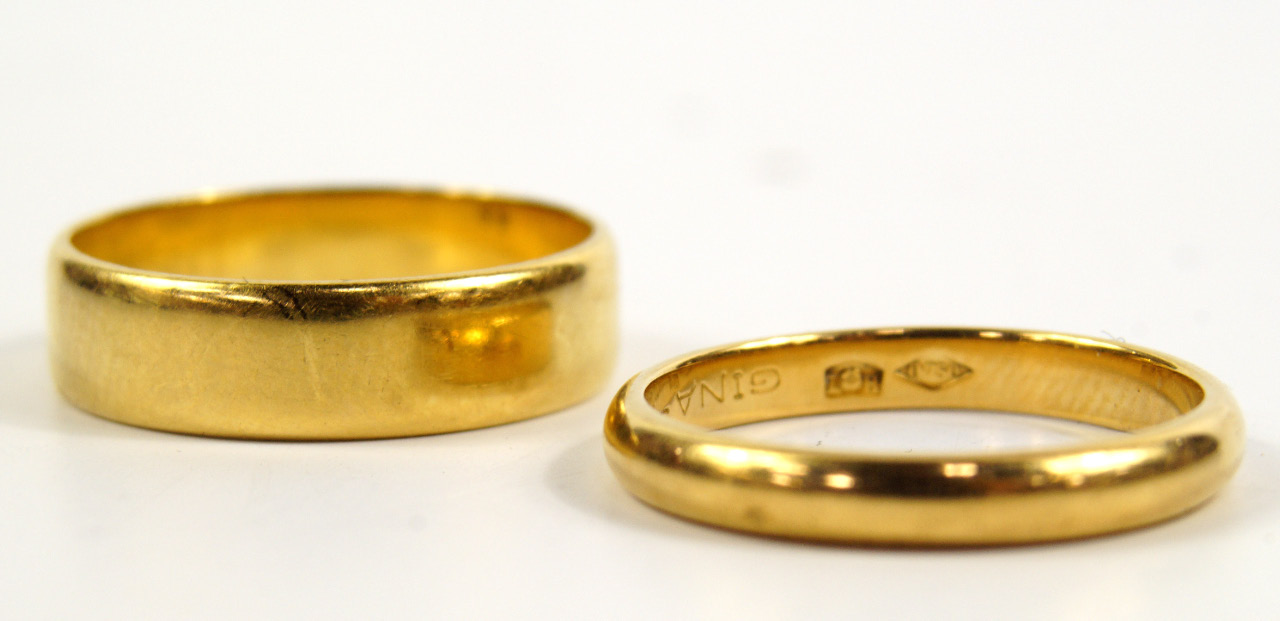 Appraisal: Two wedding bands one wide the other narrow sizes Q