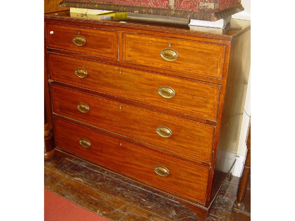 Appraisal: A Georgian mahogany chest with walnut cross banded detail and