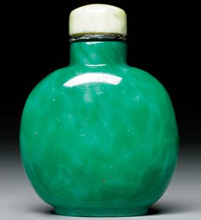 Appraisal: ANTIQUE GLASS SNUFF BOTTLE Antique carved emerald green glass snuff