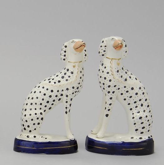 Appraisal: PAIR OF STAFFORDSHIRE FIGURES OF DALMATIONS Circa - Seated on