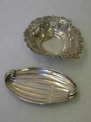 Appraisal: A VICTORIAN PIN TRAY of leaf form on bun feet