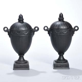 Appraisal: Pair of Wedgwood Black Basalt Engine-turned Vases and Covers England