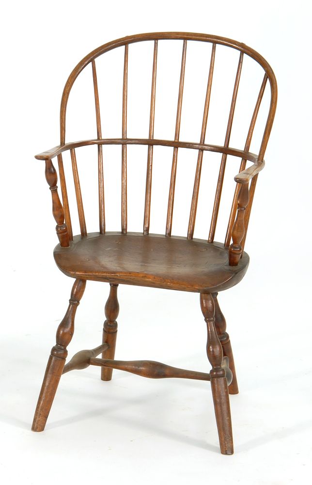 Appraisal: ANTIQUE AMERICAN BOWBACK WINDSOR ARMCHAIR Circa With carved and molded