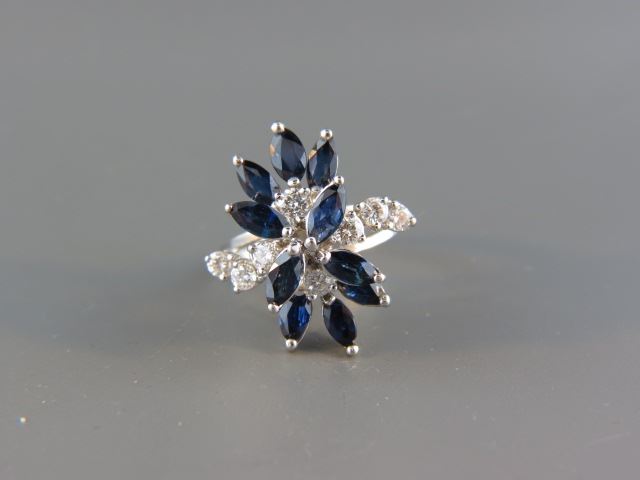 Appraisal: Sapphire Diamond Ring vivid blue marquise gems totaling carat and