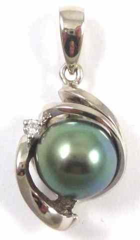 Appraisal: TAHITIAN PEARL AND DIAMOND PENDANT k white gold features a