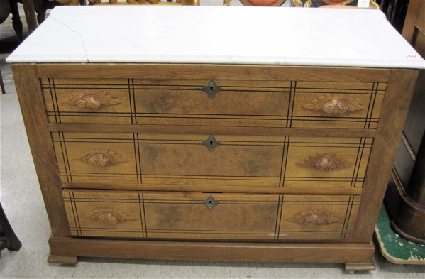 Appraisal: VICTORIAN THREE-DRAWER WALNUT CHEST Eastlake design American c having a