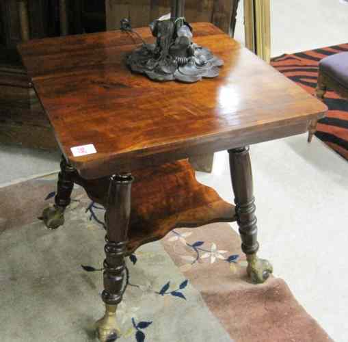 Appraisal: LATE VICTORIAN MAHOGANY LAMP TABLE American th century having a