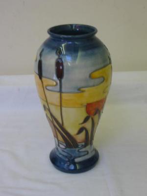 Appraisal: A MOORCROFT POTTERY VASE of baluster form tube lined in