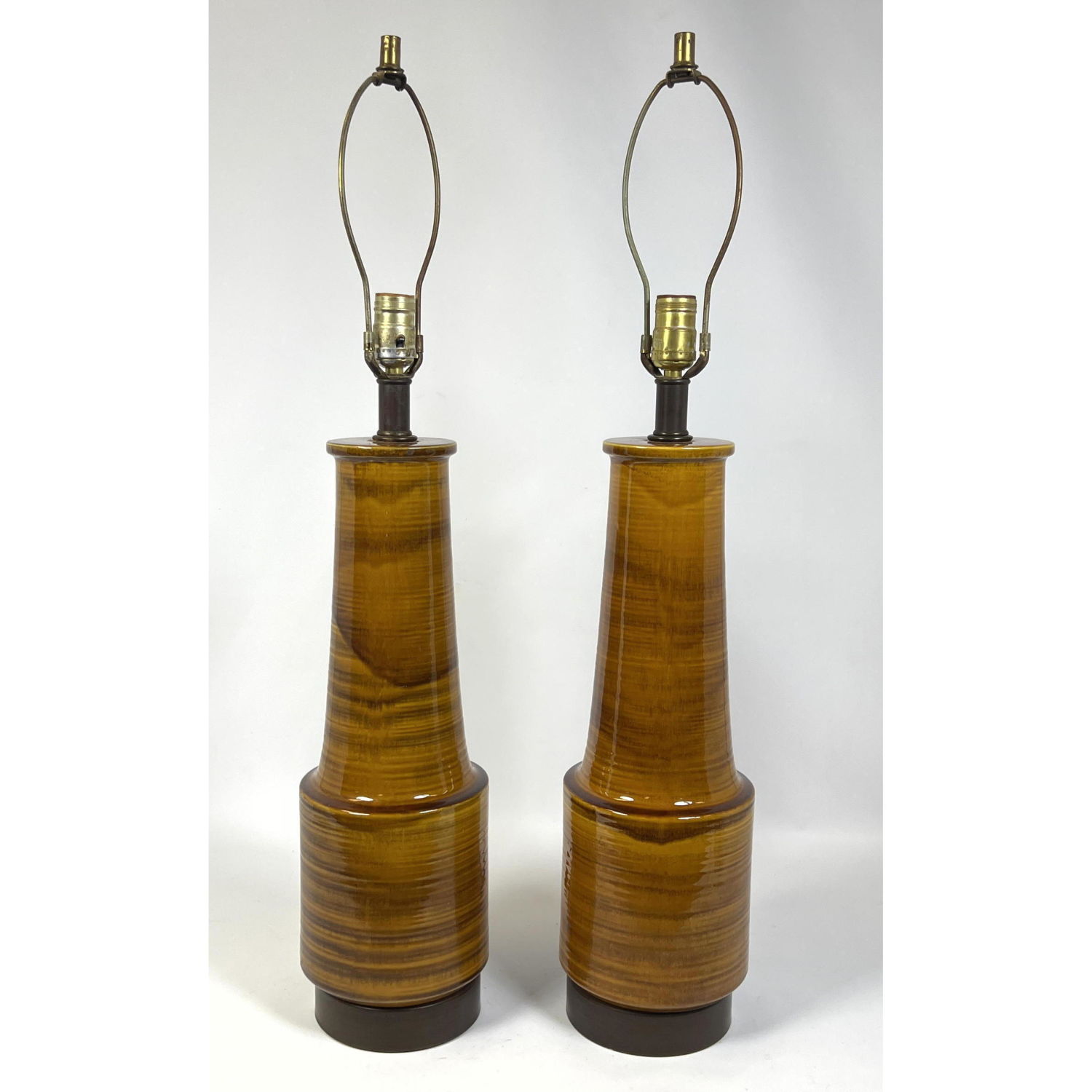 Appraisal: Pair Mid Century Modern Pottery Table Lamps Dimensions H inches