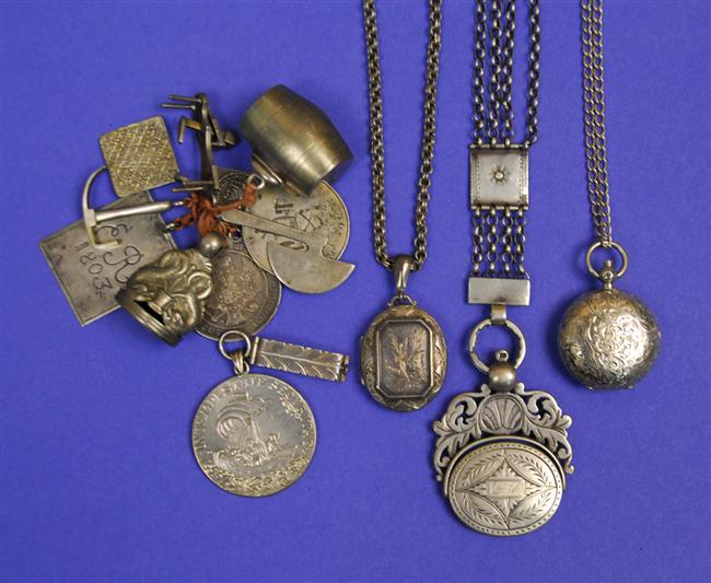 Appraisal: ASSEMBLAGE OF CONTINENTAL SILVER PENDANTS CHARMS AND COINS bearing various