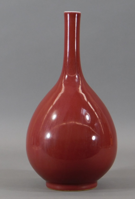 Appraisal: CHINESE KANGXI OXBLOOD PORCELAIN BOTTLE VASE China th CenturyBottle form