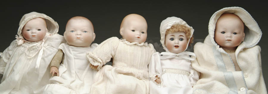 Appraisal: LOT OF GERMAN BISQUE HEAD CHARACTER BABIES Pair of bye-lo