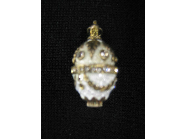 Appraisal: Enameled Sterling Faberge Style Egg charm or pendant jeweled