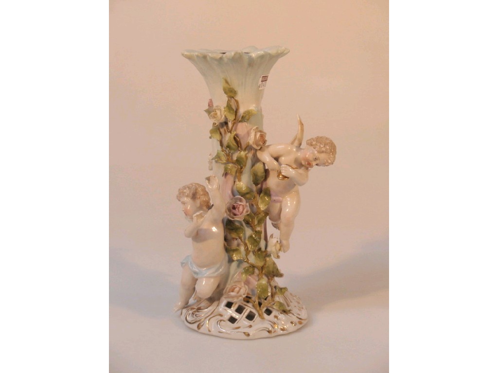 Appraisal: A Sitzendorf porcelain candelabrum base the rose encrusted stem with