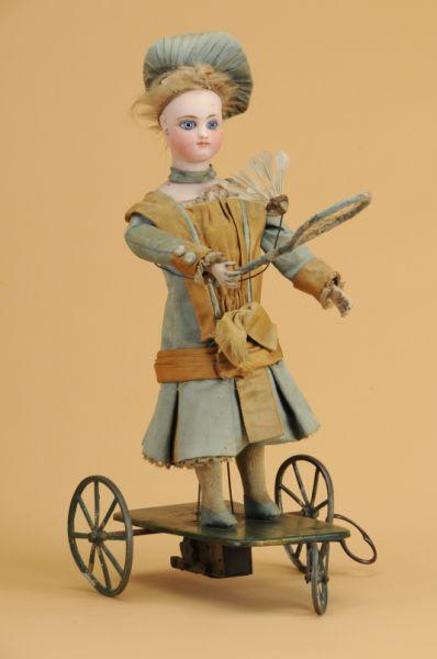 Appraisal: Roullet Decamps Badminton Player Mechanical Toy France ca bisque socket