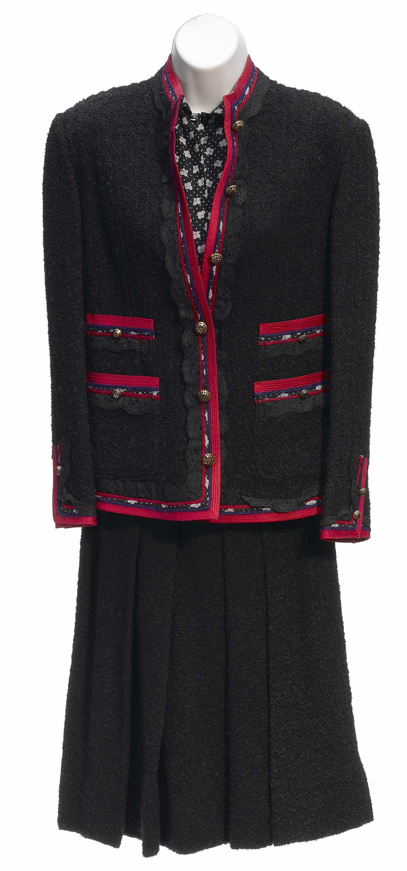 Appraisal: A Koos black boucl and red trimmed jacket and skirt