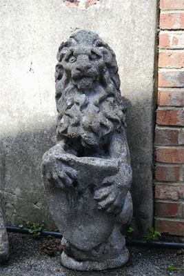 Appraisal: A reconstituted stone model of an heraldic lion in cm