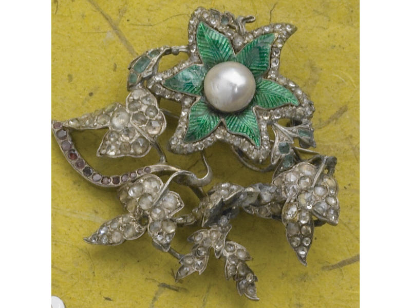 Appraisal: ENAMEL BROOCH with flower design featuring one mm half pearl