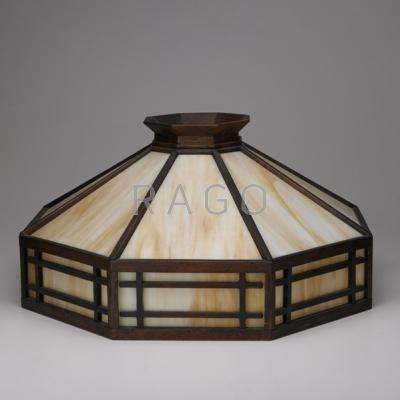 Appraisal: ARTS AND CRAFTS Octagonal slag glass lamp shade with quarter