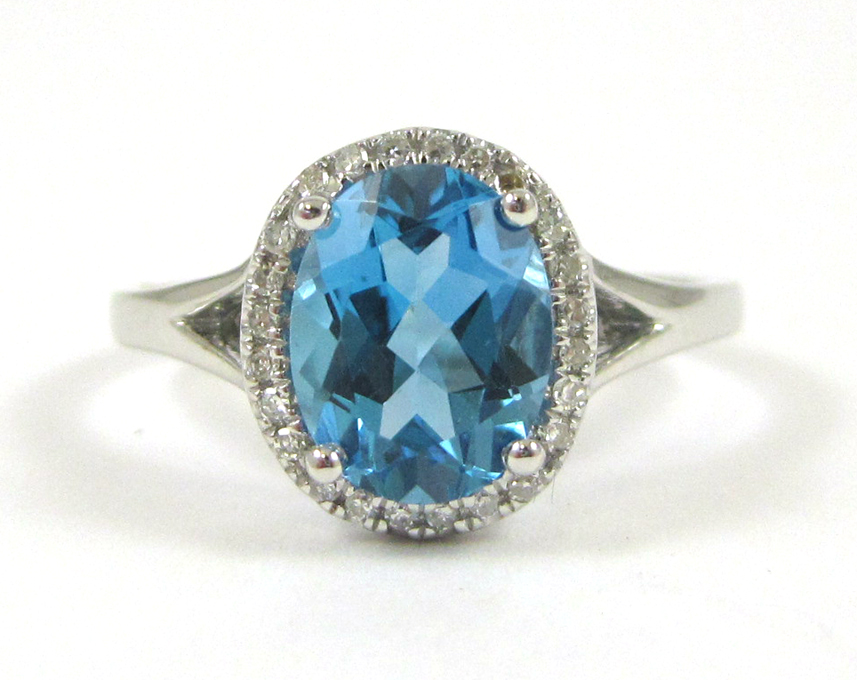 Appraisal: BLUE TOPAZ DIAMOND AND WHITE GOLD RING The k white