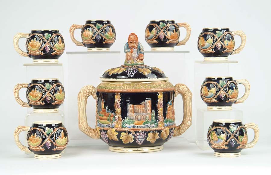 Appraisal: NINE PIECE GERMAN PUNCH SET Set consists of four-liter two