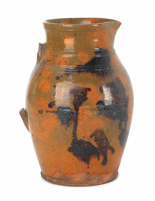 Appraisal: Pennsylvania redware pitcher th c with manganese splotching h