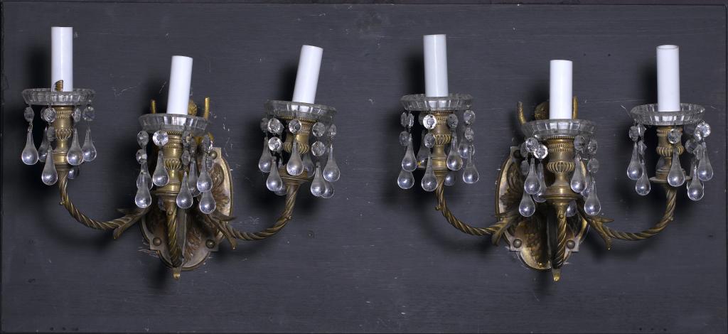 Appraisal: A PAIR OF GILT BRONZE WALL LIGHTS in the form