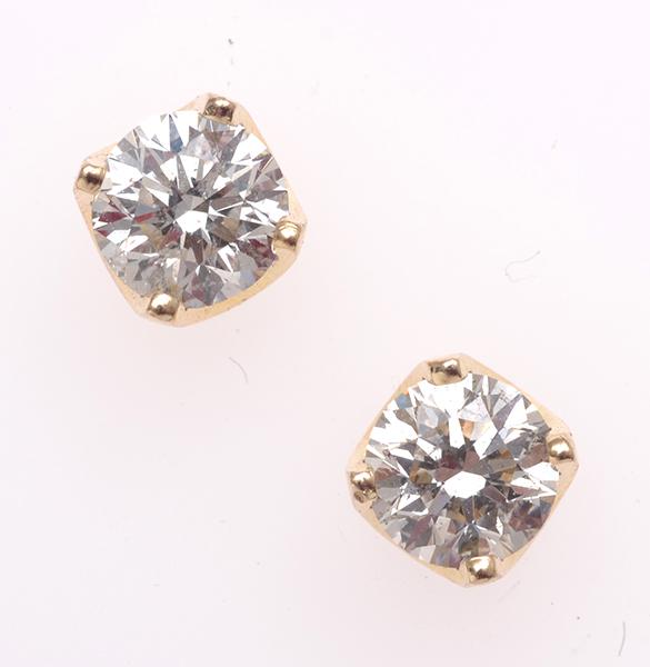 Appraisal: A PAIR OF DIAMOND STUD EARRINGS TOTALLING APPROXIMATELY CTS IN