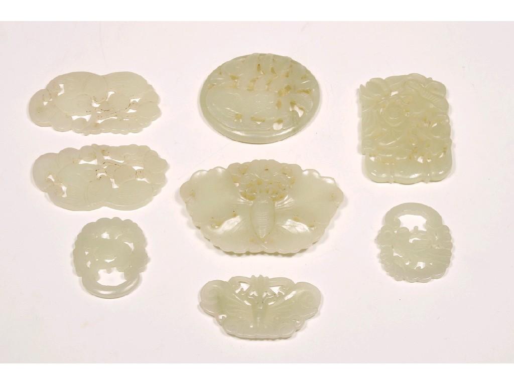 Appraisal: EIGHT PALE CELADON JADE PLAQUES including one of a butterfly