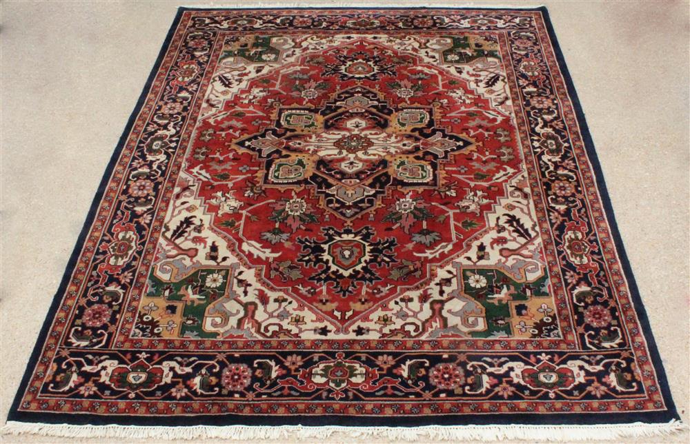 Appraisal: LARGE HERIZ WOOL RUG central medallion with corner brackets floral