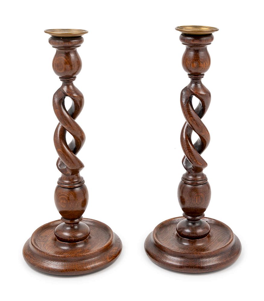 Appraisal: A Pair of English Turned Oak Candlesticks Heig A Pair