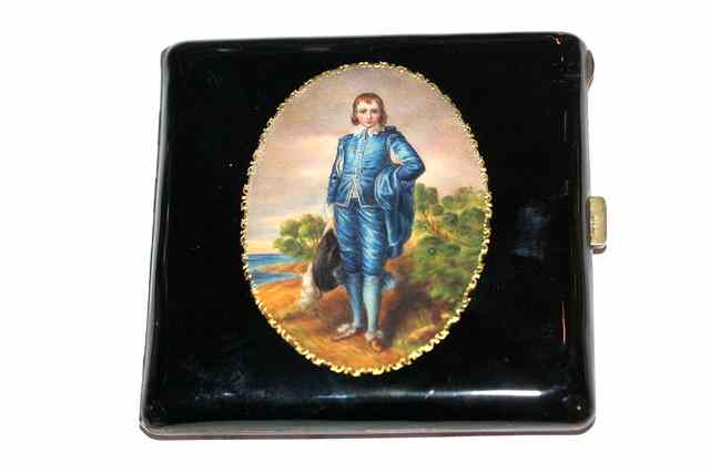 Appraisal: A CONTINENTAL SILVER AND ENAMELLED CIGARETTE CASE oval panel painted