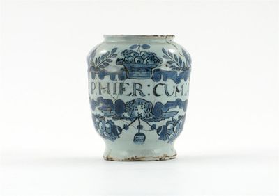 Appraisal: An unusual delftware small drug or pill jar painted with