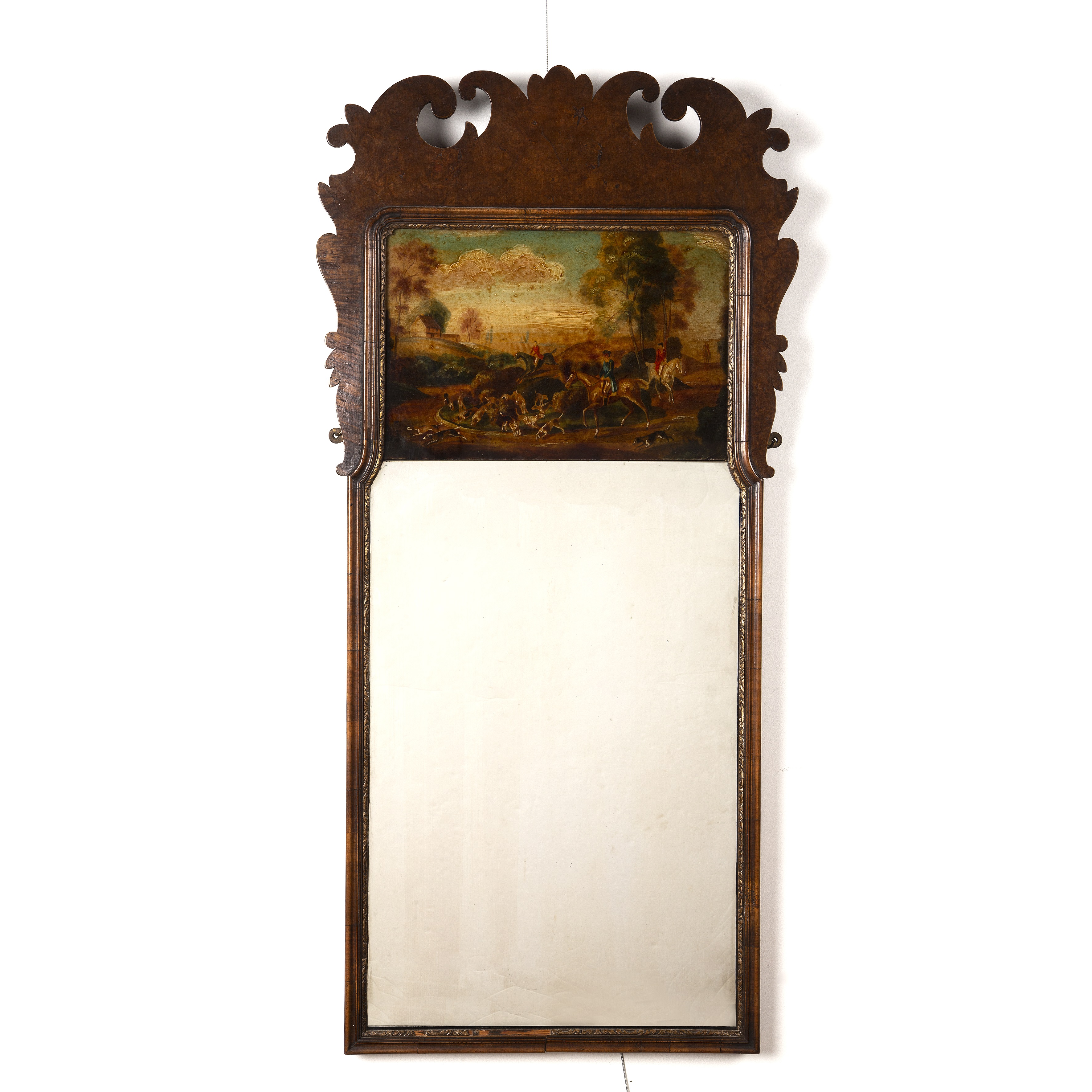 Appraisal: Walnut fret wall mirror th Century style inset with a