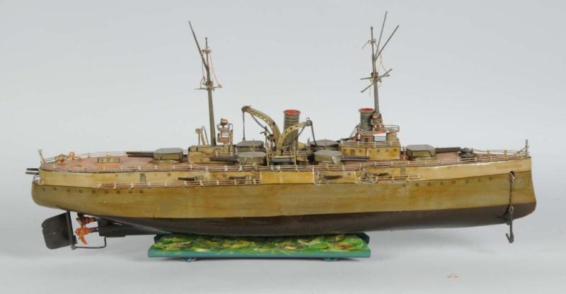 Appraisal: Tin Marklin Wilmington Battleship Toy Description German Clockwork mechanism is