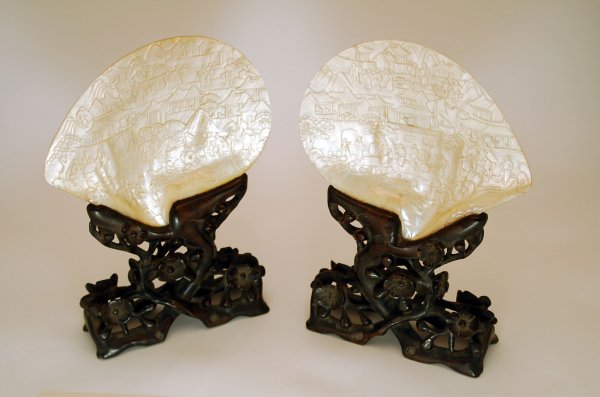 Appraisal: Two carved mother-of-pearl shells with scenes of Chinese daily life