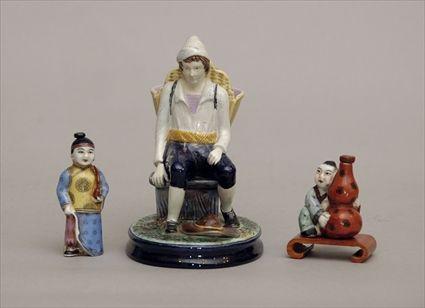 Appraisal: Figure together with Two Figural Snuff Boxes