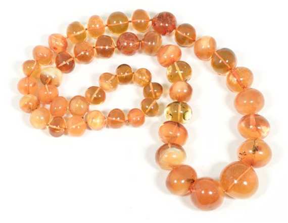 Appraisal: YELLOW AMBER NECKLACE Exceptional endless sautoir of honey-coloured graduated baroque