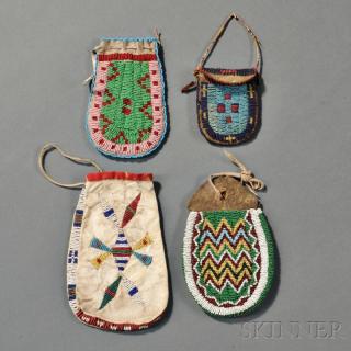 Appraisal: Four Plains U-shaped Beaded Hide Pouches c late th century