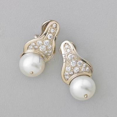 Appraisal: RUVEN PERELMAN SOUTH SEA PEARL AND DIAMOND EARRINGS k gold