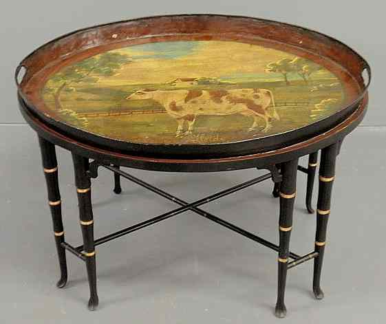 Appraisal: Oval Tole tray top table the tray painted with Heidi