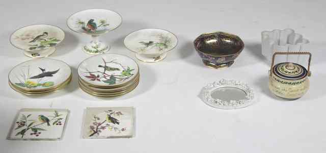 Appraisal: A Minton's dessert service decorated birds comprising twelve plates two