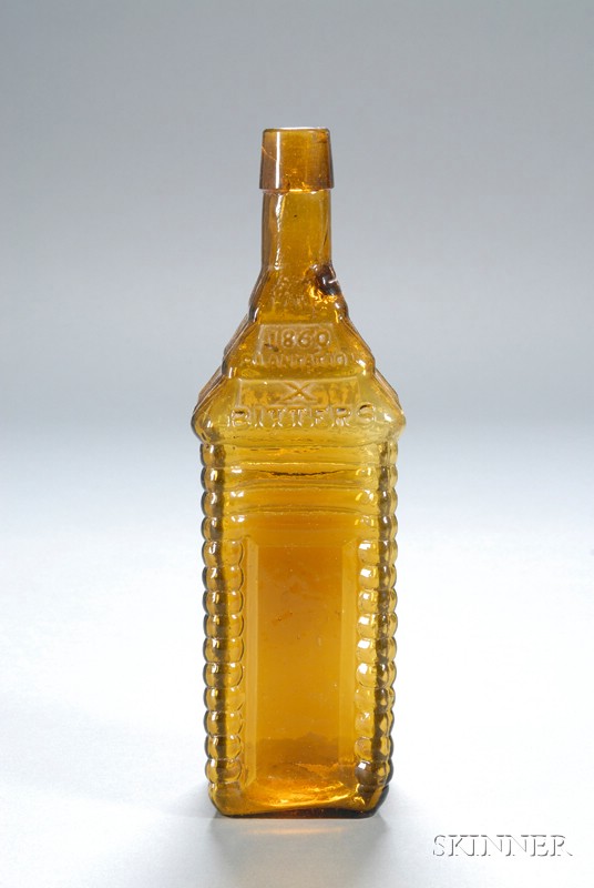 Appraisal: St Drake's Golden Glass Cabin-form Bitters Bottle - tall four-log