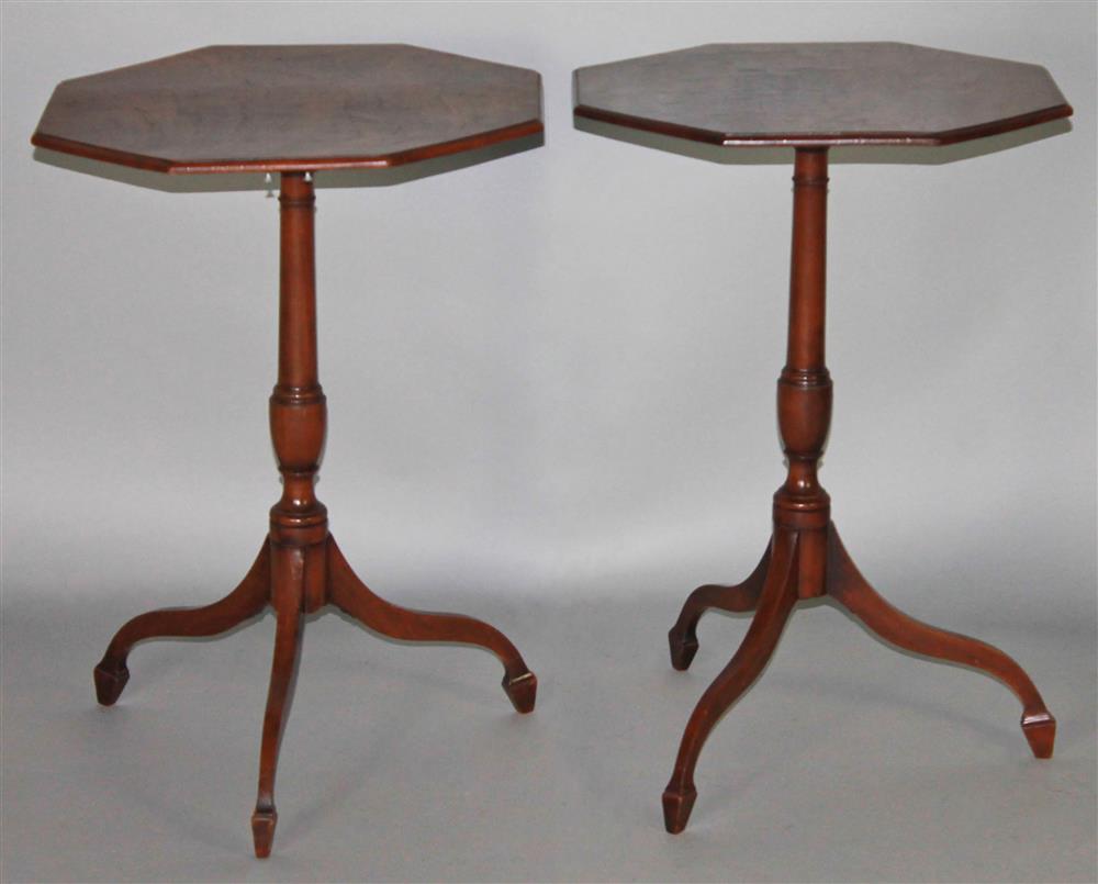 Appraisal: PAIR OF GEORGE III MAHOGANY TRIPOD CANDLESTANDS each octagonal molded