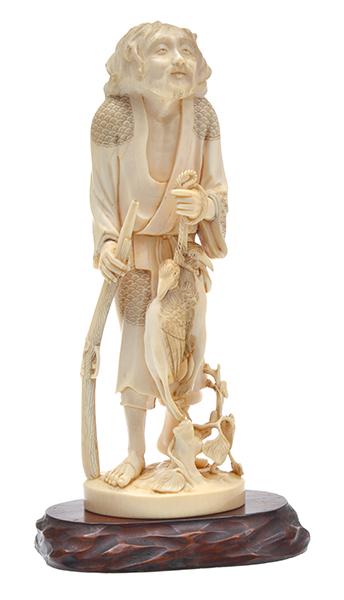 Appraisal: A JAPANESE IVORY OKIMONO OF A HUNTER MEIJI PERIOD TH