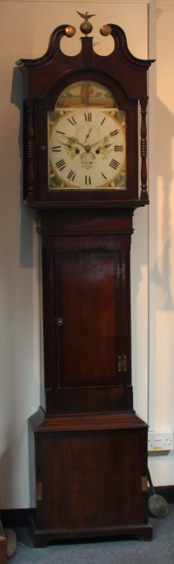 Appraisal: An oak longcase clock with painted arch dial and swan