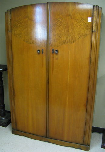 Appraisal: TWO-DOOR WALNUT WARDROBE English mid th century having a pair